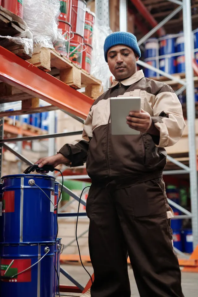 Warehouse aisle with stacked inventory